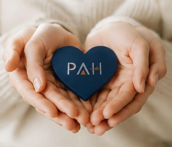 Proper Allied Health heart logo held in caring hands.